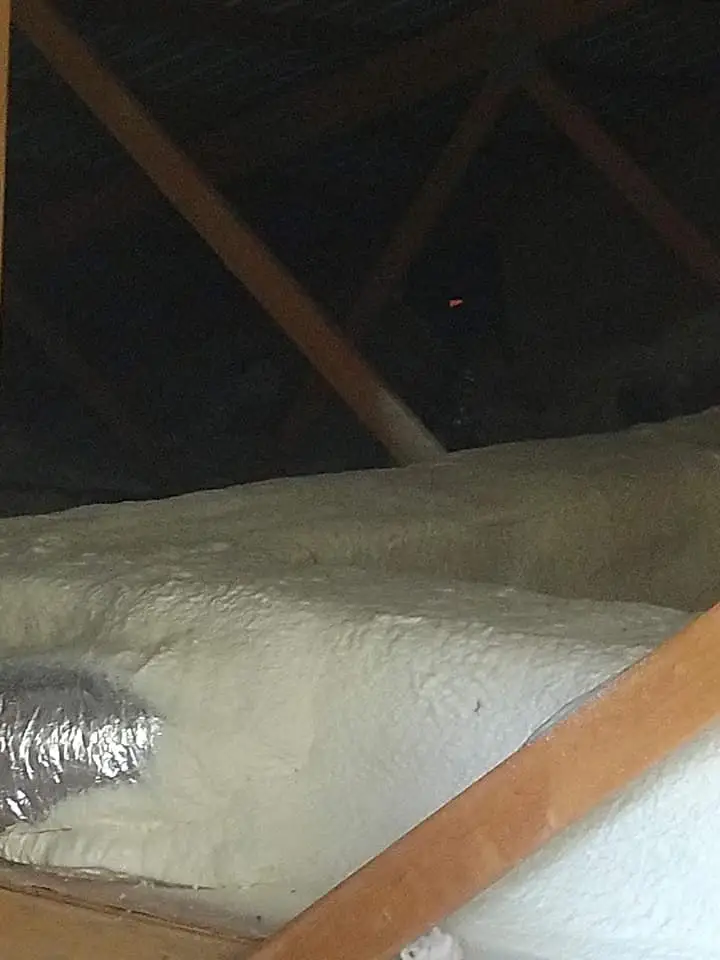 Closed-cell foam in an attic over ductwork