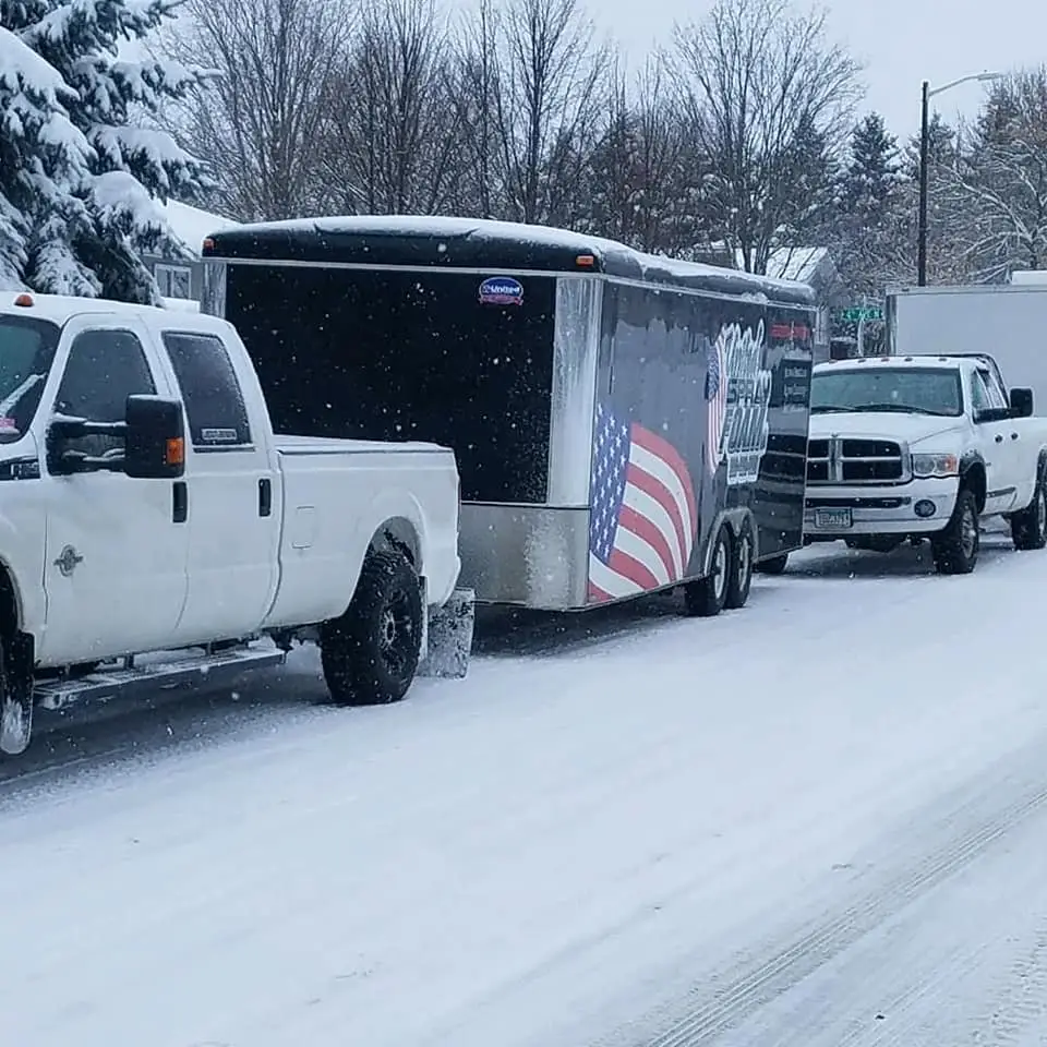 United Spray Foam trucks and trailer in Minnesota snow